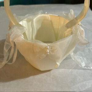Ivory flower girl basket with satin/sheer bows New With Small Stain (pictured)